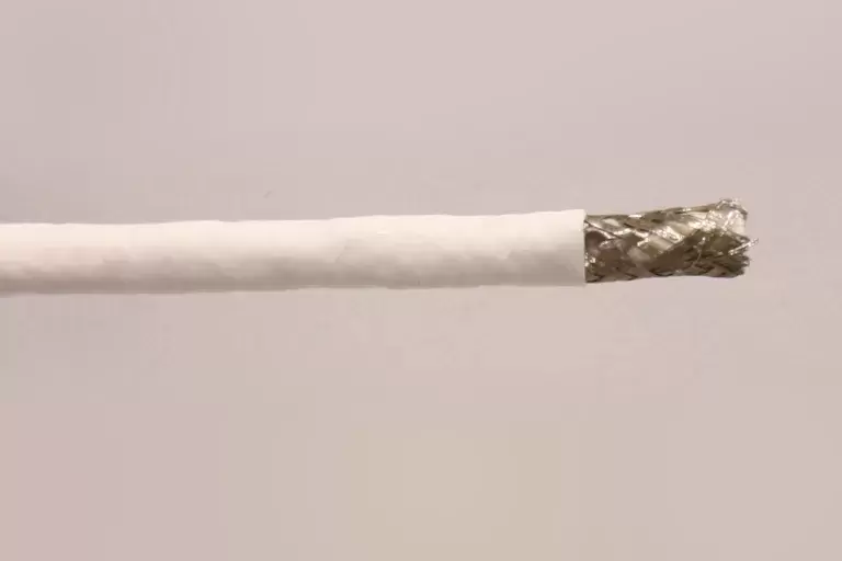 silver colored wire inside wrapper of white color.